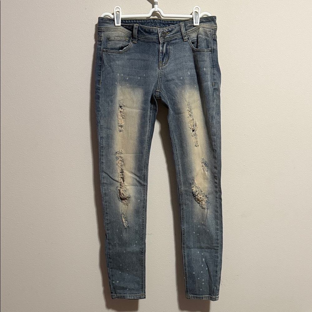 Revolution and Revolt distressed and ripped grunge style blue denim jeans